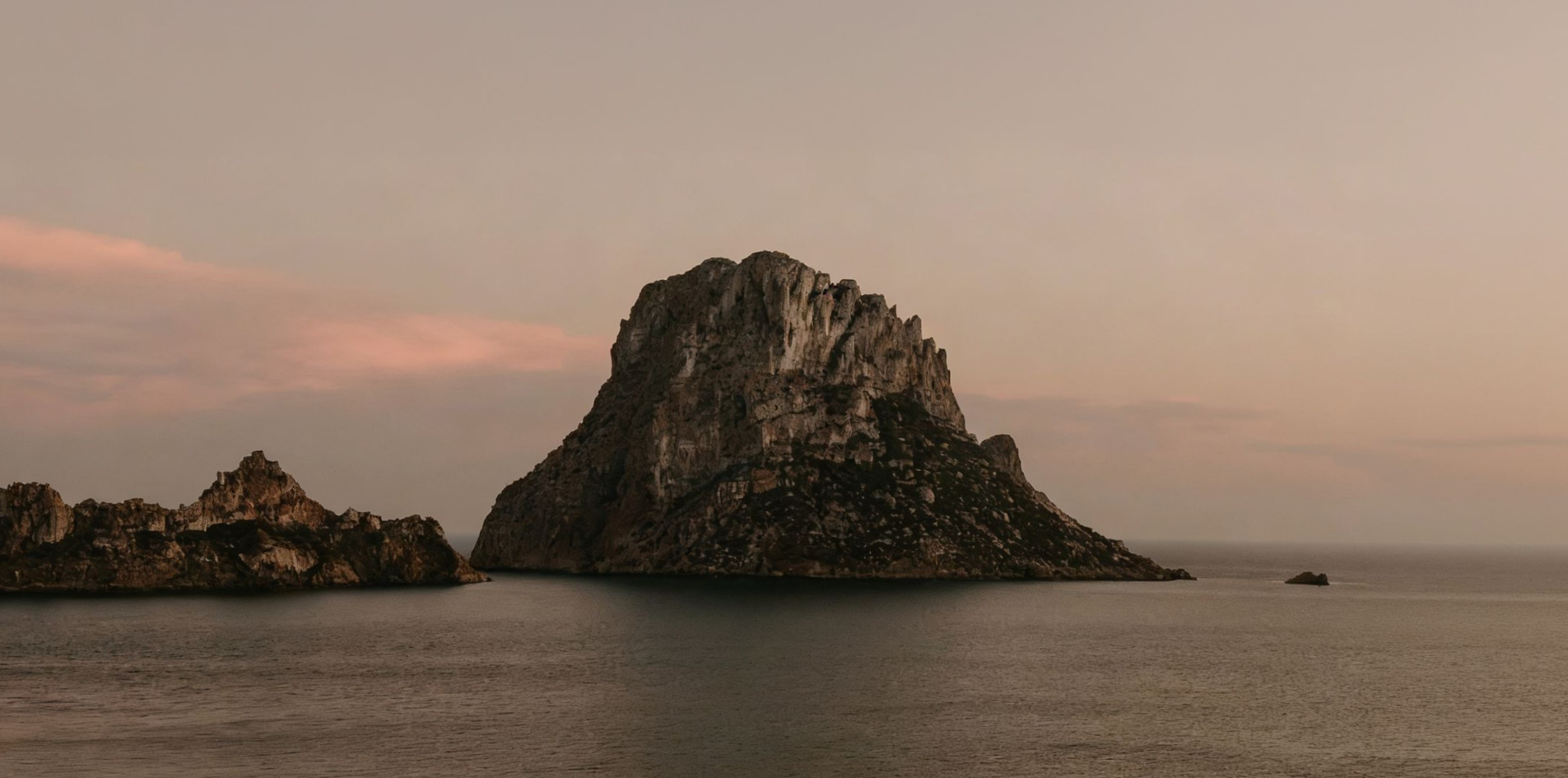 Es Vedrà at dusk, the island that gives VEDRA its name